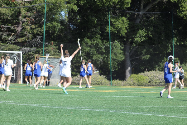 Varsity lacrosse is celebrating a goal made by Charlotte Parks.